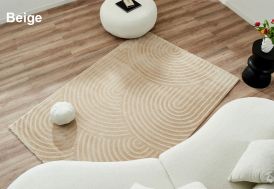 Tapis beige avec motifs en relief en intérieur