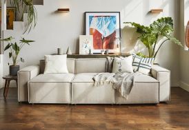 Canapé 3 places en tissu simili lin beige Swyft Home dans salon