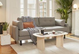 Canapé lit en tissu gris Swyft Home dans salon