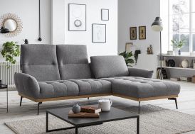 canapé en polyester gris avec appuis-tête dépliés en intérieur