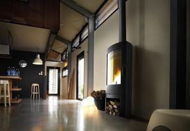 poêle à bois en fonte anthracite avec système double combustion 12 kW